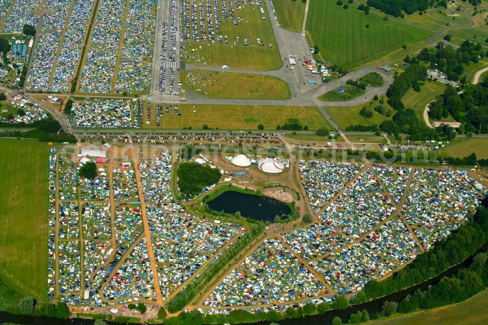 Lärz from the bird's eye view: Crowd of visitors to the Fusion Festival at the airfield Laerz - Rechlin in Laerz in Mecklenburg-Vorpommern, Germany