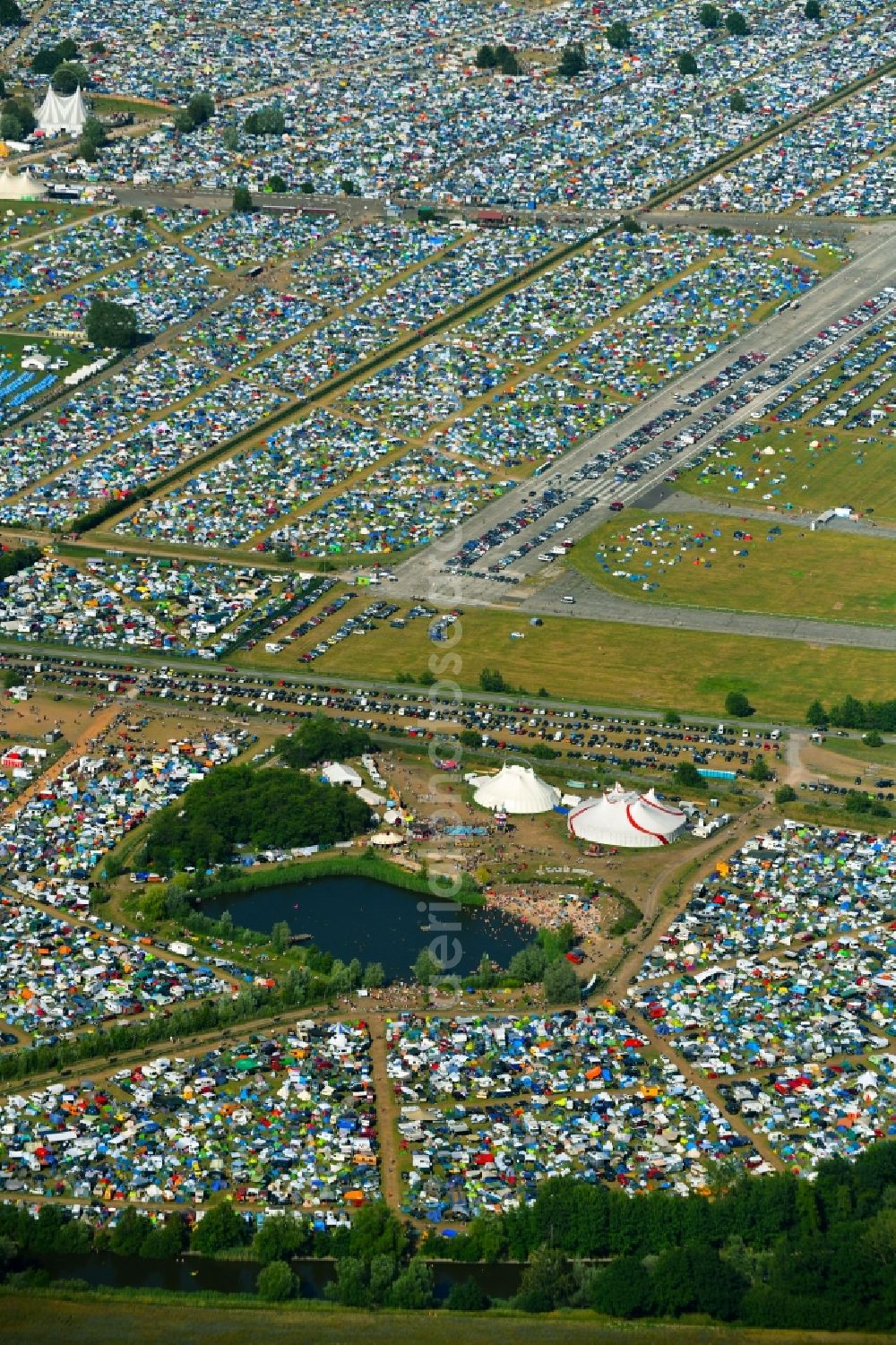 Lärz from above - Crowd of visitors to the Fusion Festival at the airfield Laerz - Rechlin in Laerz in Mecklenburg-Vorpommern, Germany