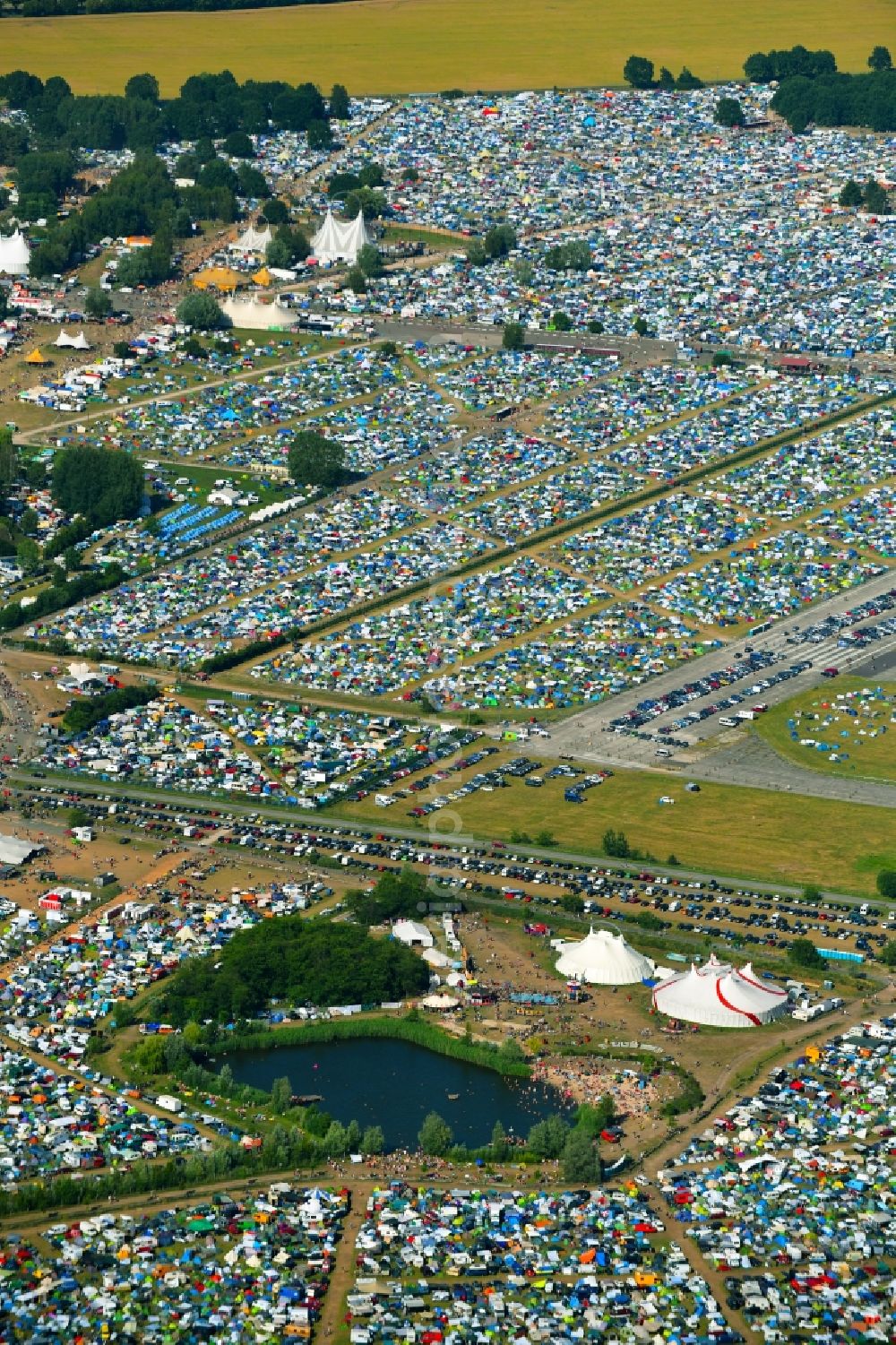 Aerial photograph Lärz - Crowd of visitors to the Fusion Festival at the airfield Laerz - Rechlin in Laerz in Mecklenburg-Vorpommern, Germany