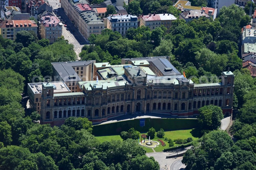 München from above - The Maximilianeum in Munich Haidhausen in the state of Bavaria. The historic building on the Isar-Hochufer at Maximiliansbruecke is home to the Maximilianeum Foundation and is the seat of the Bavarian State Parliament