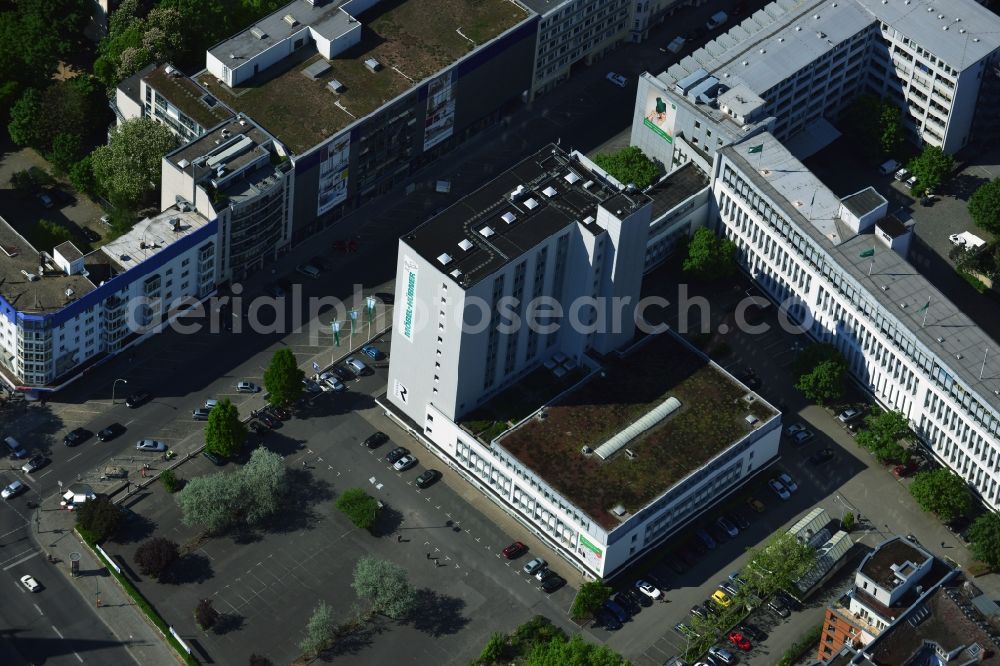 Berlin from the bird's eye view: In Genthiner street from the Tiergarten district of Berlin is the furniture store Huebner a large furniture store. On 12 sales floors furniture and home accessories are also available. On the opposite side of the street offers furniture store Krieger also to furniture