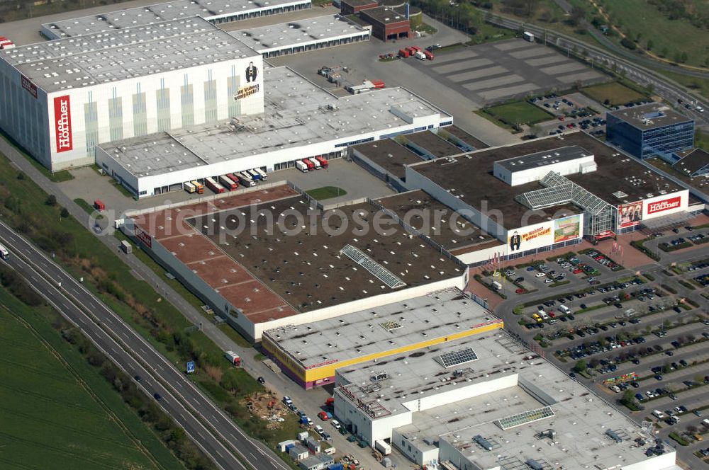 Berlin from above - Blick auf das Möbel-Höffner Einrichtungshaus im Gewerbegebiet Airport Center Waltersdorf in Berlin-Waltersdorf. View of the furniture store Möbel-Höffner in the business park Airport Center Waltersdorf in Berlin-Waltersdorf.