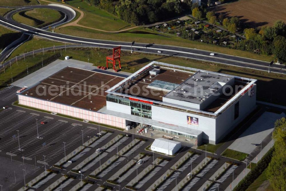 Eschborn from the bird's eye view: Blick auf das größte Einrichtungshaus Mann Mobilia im Raum Frankfurt am Main in der Elly-Beinhorn-Str. 3, 65760 Eschborn - Tel.: 06196-7743-400 - Fax: 06196 -7743-499 - Öffnungszeiten: Mo - Fr: 10.00 bis 19.00 Uhr Sa: 10.00 bis 20.00 Uhr - Email: mann-mobilia-eschborn@mann-mobilia.de