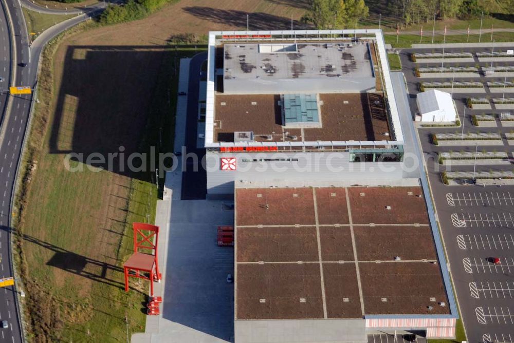 Aerial photograph Eschborn - Blick auf das größte Einrichtungshaus Mann Mobilia im Raum Frankfurt am Main in der Elly-Beinhorn-Str. 3, 65760 Eschborn - Tel.: 06196-7743-400 - Fax: 06196 -7743-499 - Öffnungszeiten: Mo - Fr: 10.00 bis 19.00 Uhr Sa: 10.00 bis 20.00 Uhr - Email: mann-mobilia-eschborn@mann-mobilia.de