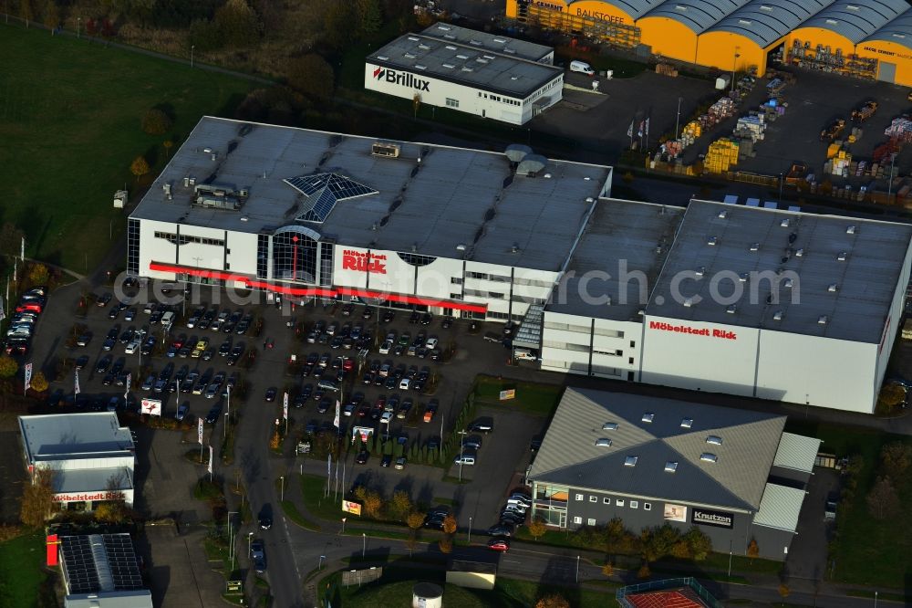 Aerial image Neubrandenburg - Furniture Store city back of BDSK Handels GmbH & Co. KG. The center is situated on the outskirts on Akeleiweg. In the background are the branches of Brillux GmbH & Co. KG, and Jacob Cement Baustoffe (Jacob Sönnichsen AG). The site is in Neubrandenburg in Mecklenburg-Western Pomerania