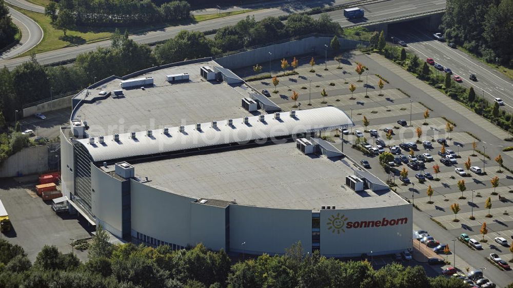 Aerial image Lüdenscheid - Das Möbelhaus Sonneborn an der Autobahn-Ausfahrt Lüdenscheid Süd im Stadtteil Hellersen. Das Einrichtungshaus wurde 2000 eröffnet und eine Betriebsfläche von 28.000 Quadratmetern. The furniture store Sonneborn at the freeway exit Lüdenscheid Sud in the district Hellersen.