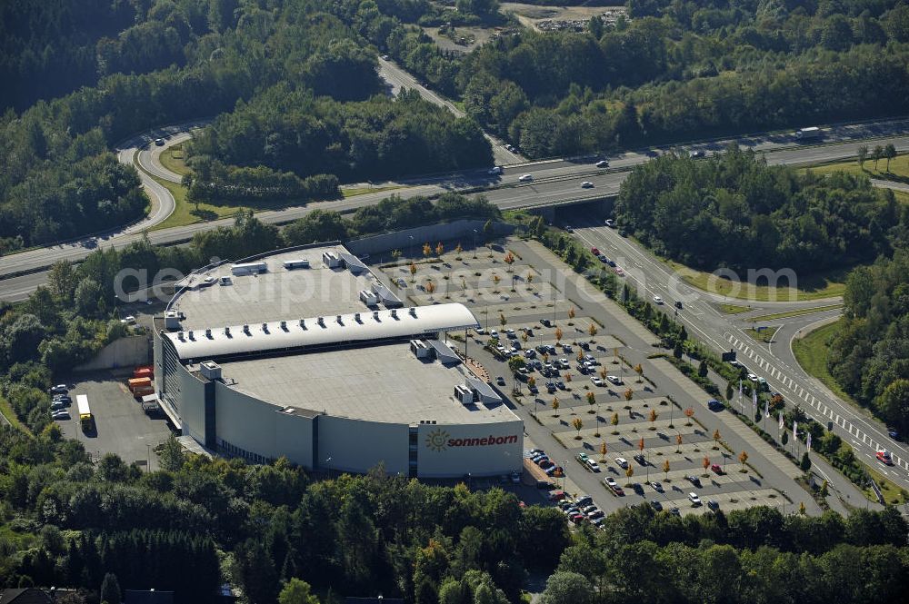 Lüdenscheid from above - Das Möbelhaus Sonneborn an der Autobahn-Ausfahrt Lüdenscheid Süd im Stadtteil Hellersen. Das Einrichtungshaus wurde 2000 eröffnet und eine Betriebsfläche von 28.000 Quadratmetern. The furniture store Sonneborn at the freeway exit Lüdenscheid Sud in the district Hellersen.