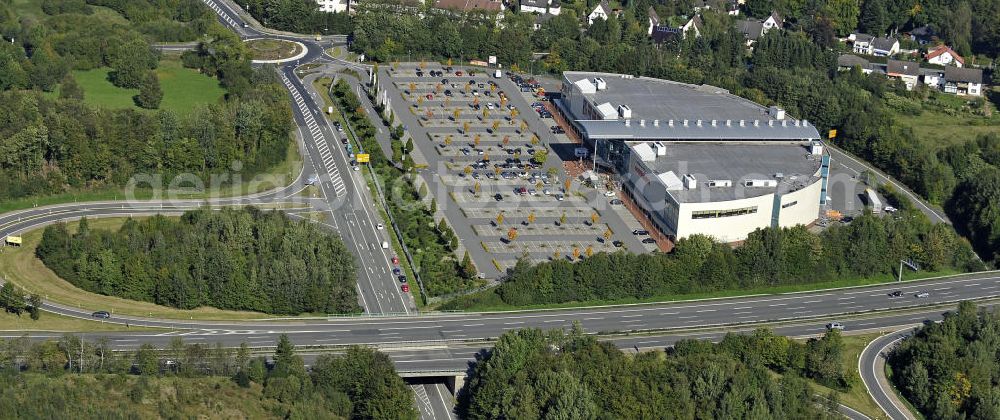 Lüdenscheid from above - Das Möbelhaus Sonneborn an der Autobahn-Ausfahrt Lüdenscheid Süd im Stadtteil Hellersen. Das Einrichtungshaus wurde 2000 eröffnet und eine Betriebsfläche von 28.000 Quadratmetern. The furniture store Sonneborn at the freeway exit Lüdenscheid Sud in the district Hellersen.