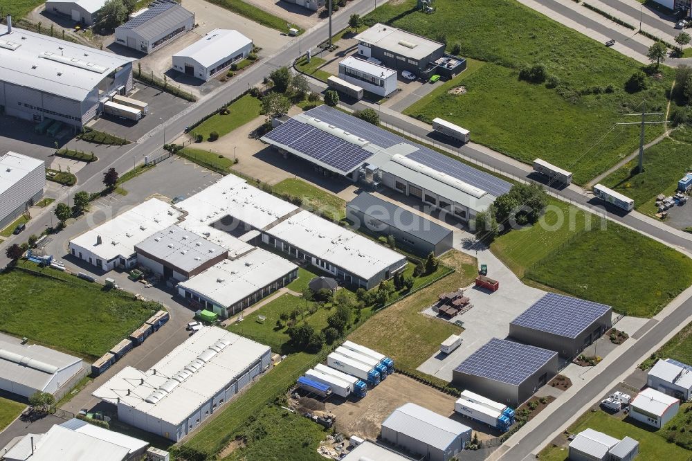 Monschau from the bird's eye view: Buildings and production halls on the premises of the cabinet maker company Breuer CNC-Fraestechnik + Schreinerei in the district Imgenbroich in Monschau in the state North Rhine-Westphalia, Germany