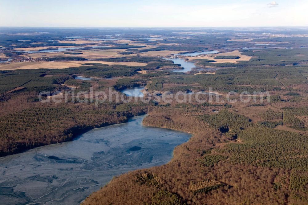 Aerial image Wustrow - Die Mecklenburgisch-Brandenburgische Seenplatte im südlichen Mecklenburg-Vorpommern an der Grenze zu Brandenburg. The Mecklenburg lake district in Mecklenburg-Western Pomerania at the border to Brandenburg.