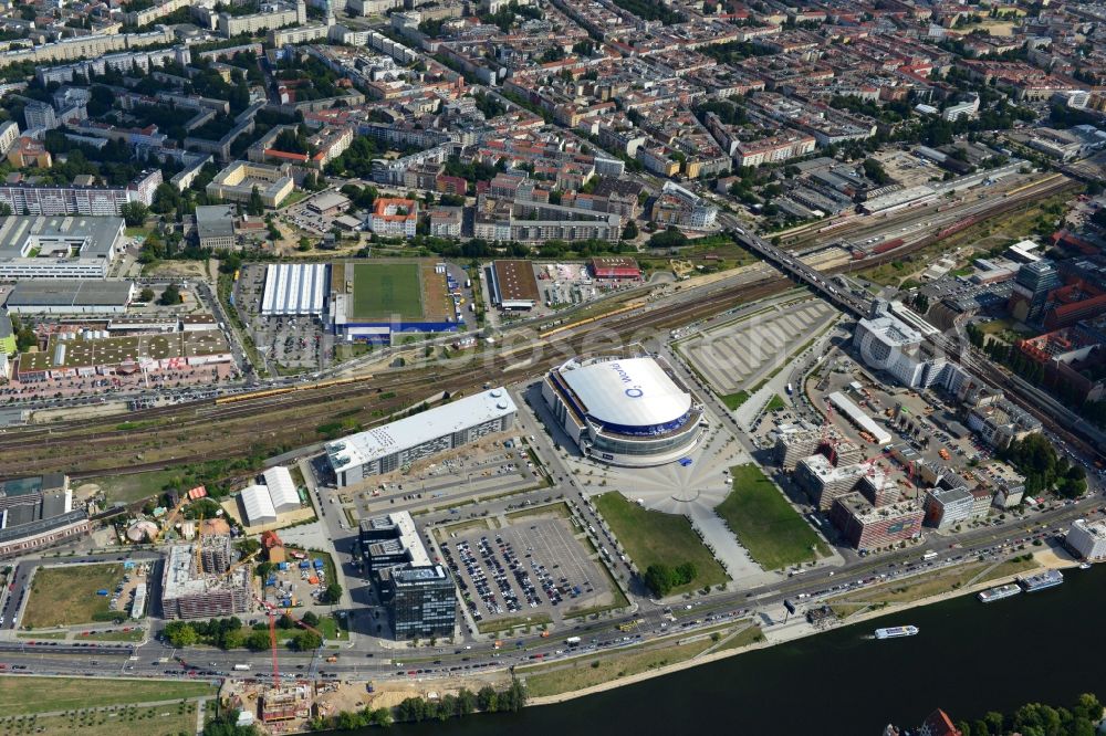 Berlin from above - View at the Media Spree area at the Spree near Ostbahnhof between Oberbaum Bridge and Schilling Bridge in the district of Kreuzberg-Friedrichshain in Berlin. Media Spree is one of the biggest investors projects in Berlin. It aims the establishment of communications and media companies along an area approximately 3.7 km long and is appropriate to restructure. The picture shows among others the O2 Arena, the East Side Gallery, the former Post Station and the Oberbaum Bridge