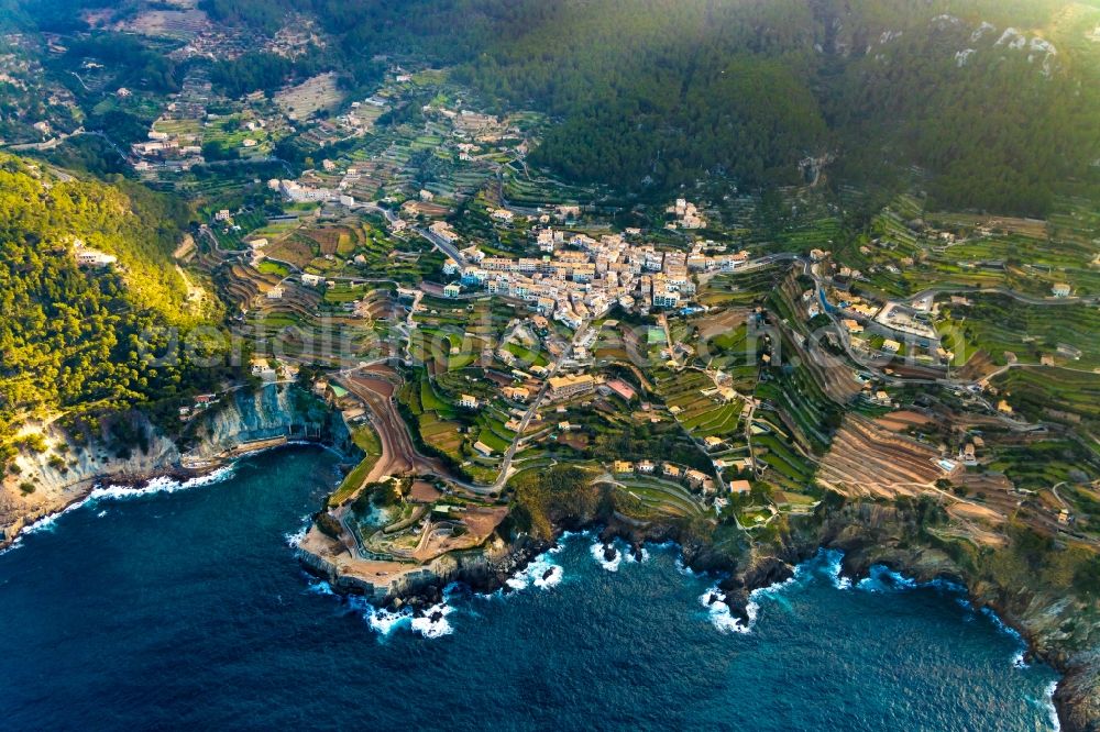 Banyalbufar from the bird's eye view: Townscape on the seacoast with a viewing platform on the peninsula S'Arenal in Banyalbufar in Balearische Insel Mallorca, Spain