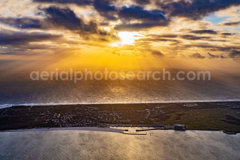 Aerial photograph Hörnum (Sylt) - Townscape on the seacoast and harbor at sunset in Hoernum (Sylt) on Island Sylt in the state Schleswig-Holstein, Germany