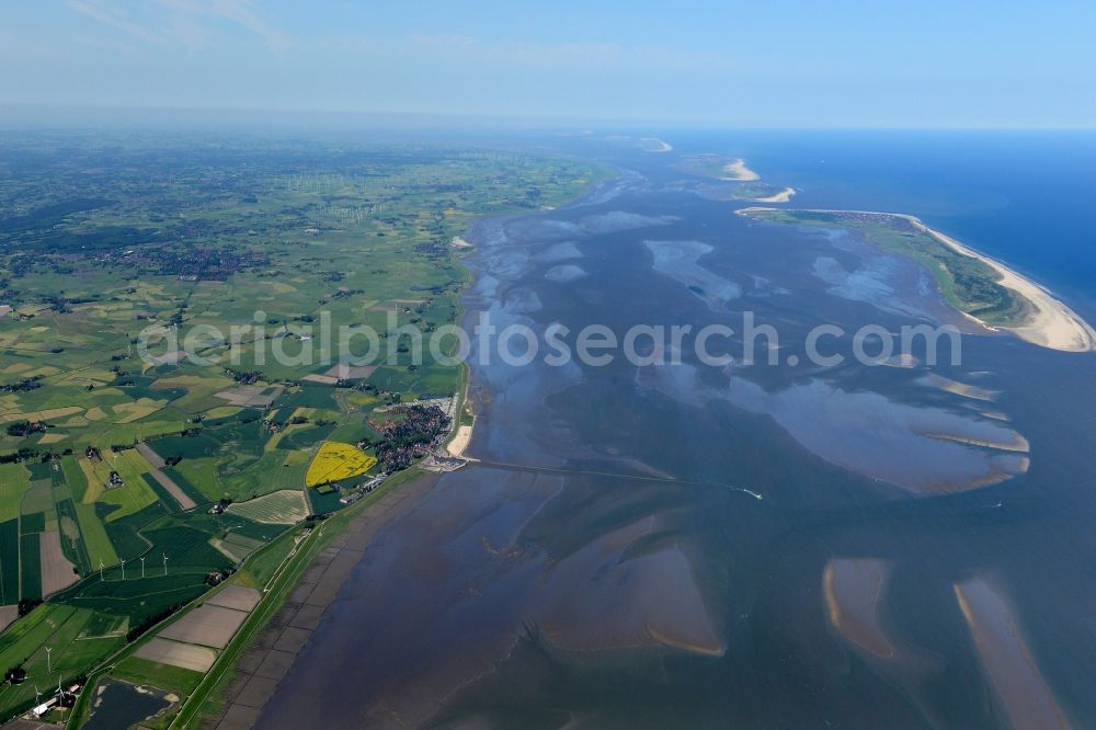 Harlesiel from the bird's eye view: Townscape on the seacoast of North Sea in Harlesiel in the state Lower Saxony