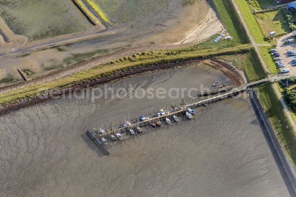 Sylt from the bird's eye view: Townscape on the seacoast of North Sea in Rantum (Sylt) in the state Schleswig-Holstein.Sportboathabour at low tide