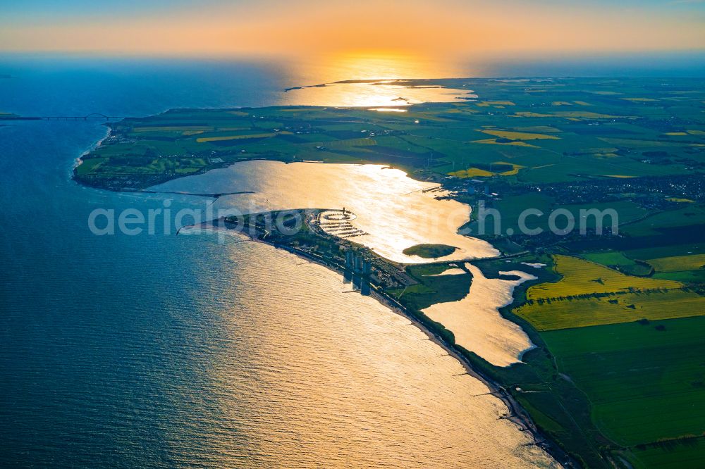 Aerial image Fehmarn - Town view on the sea coast of the Baltic Sea in Burg auf Fehmarn Suedstrand in the sunset in the state of Schleswig-Holstein