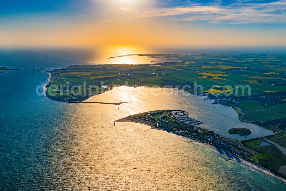 Fehmarn from above - Town view on the sea coast of the Baltic Sea in Burg auf Fehmarn Suedstrand in the sunset in the state of Schleswig-Holstein