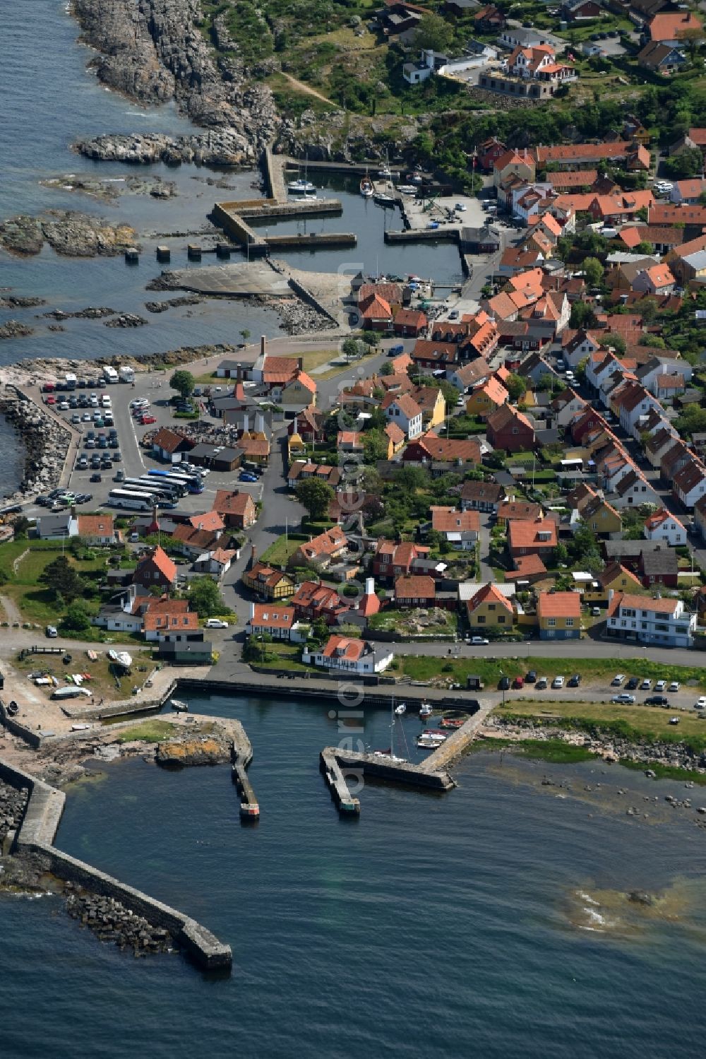 Gudhjem from the bird's eye view: Townscape on the seacoast of Baltic Sea on Bornholm Island in Gudhjem in Region Hovedstaden, Denmark