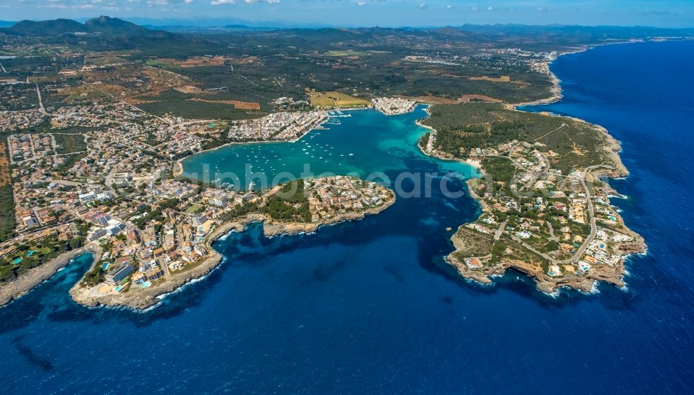 Aerial photograph Portocolom - Townscape on the seacoast with a marina in Portocolom in Balearic island of Mallorca, Spain