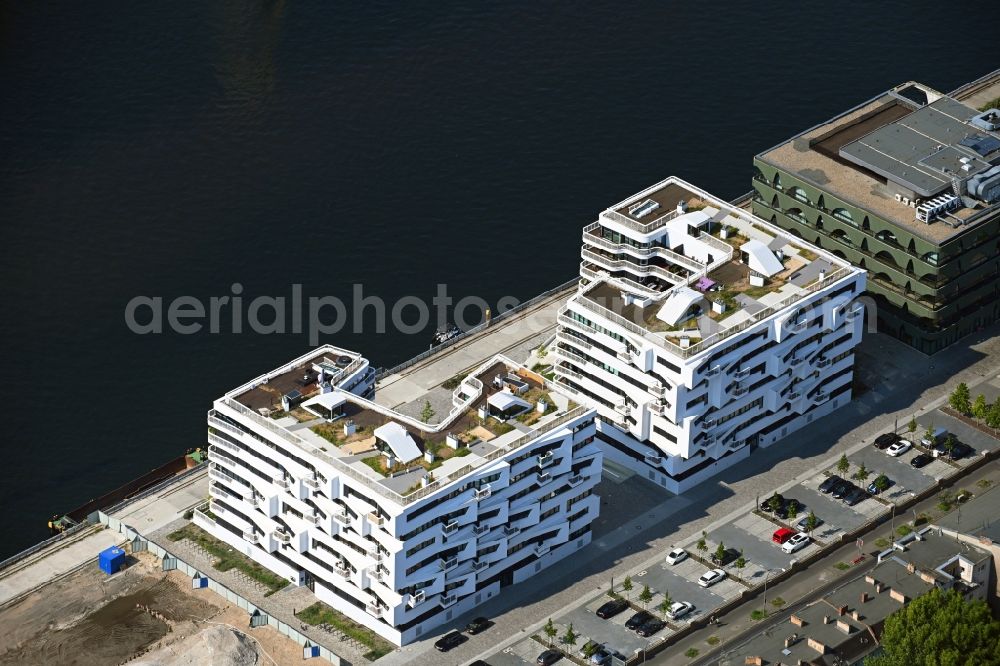 Berlin from above - Multi-family residential complex WAVE WATERSIDE LIVING BERLIN on the former Osthafen port on Stralauer Allee in the district Friedrichshain in Berlin, Germany