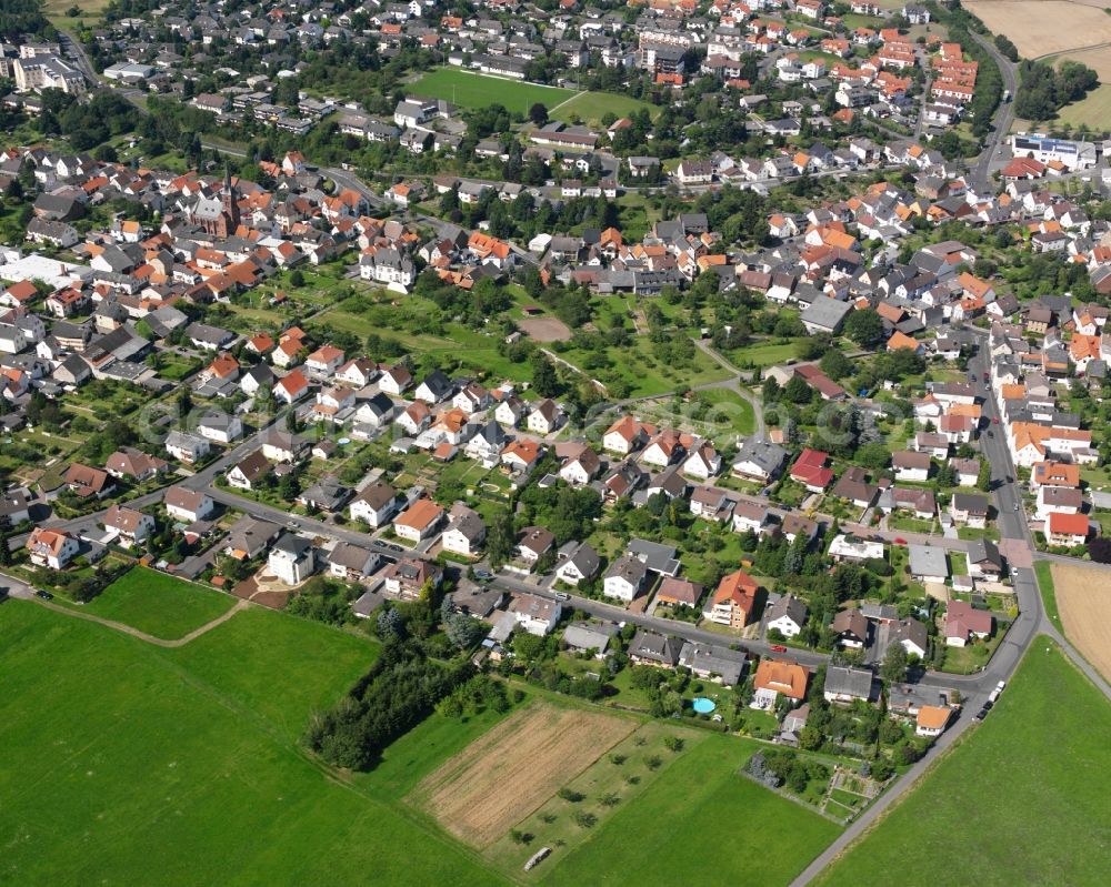 Annerod from the bird's eye view: Residential area of a multi-family house settlement in Annerod in the state Hesse, Germany