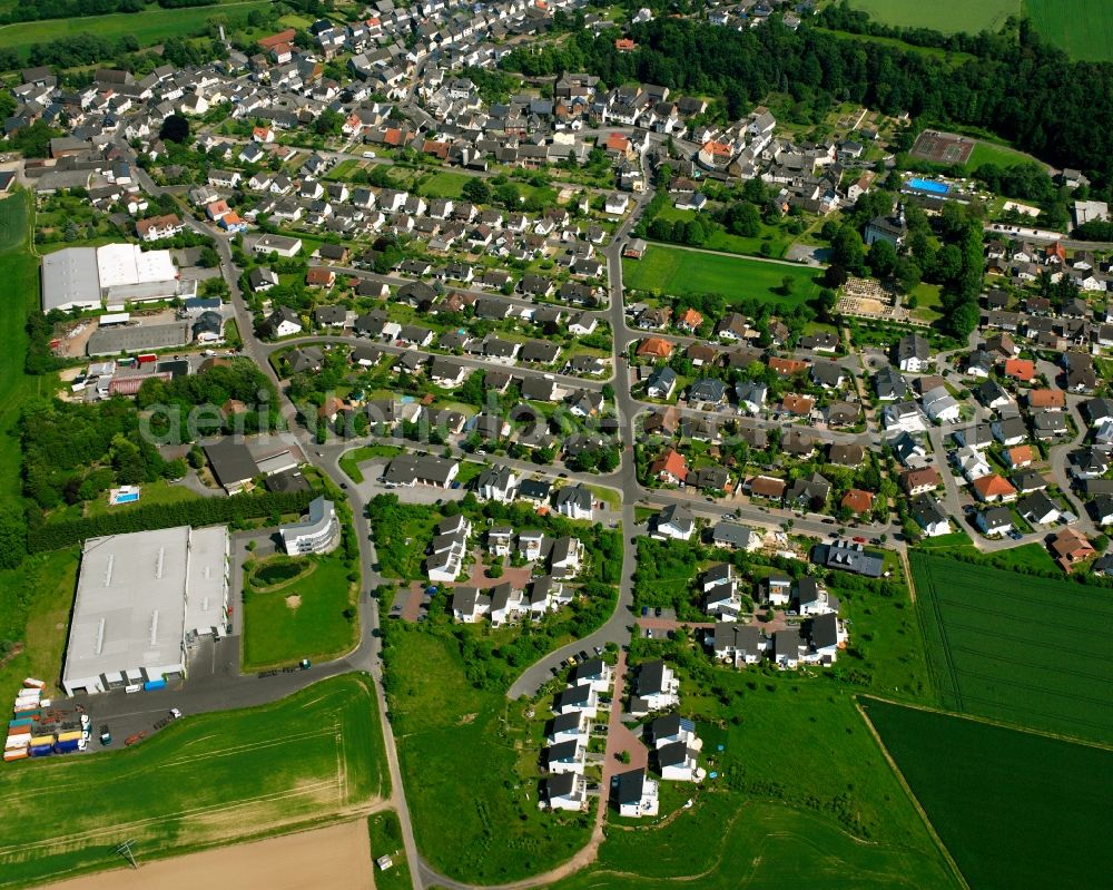 Aerial photograph Dauborn - Residential area of a multi-family house settlement in Dauborn in the state Hesse, Germany