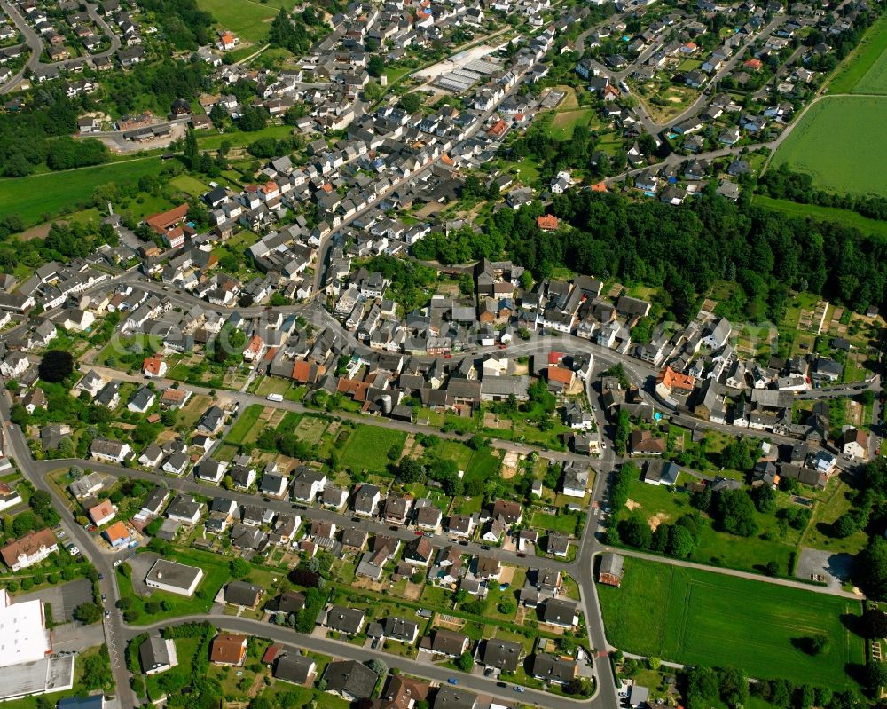 Dauborn from above - Residential area of a multi-family house settlement in Dauborn in the state Hesse, Germany