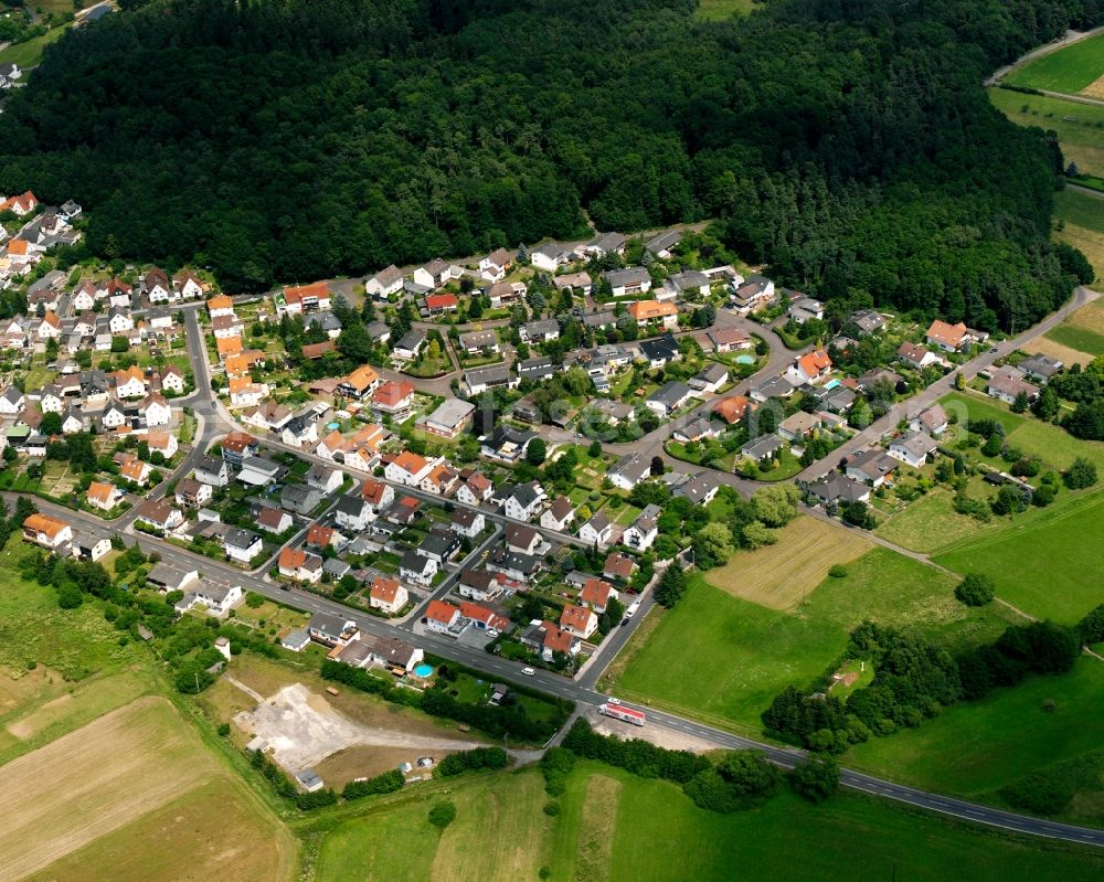 Daubringen from the bird's eye view: Residential area of a multi-family house settlement in Daubringen in the state Hesse, Germany