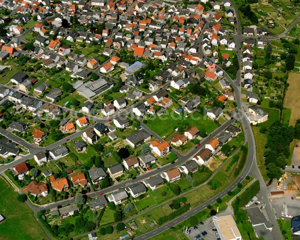 Eisenbach from the bird's eye view: Residential area of a multi-family house settlement in Eisenbach in the state Hesse, Germany