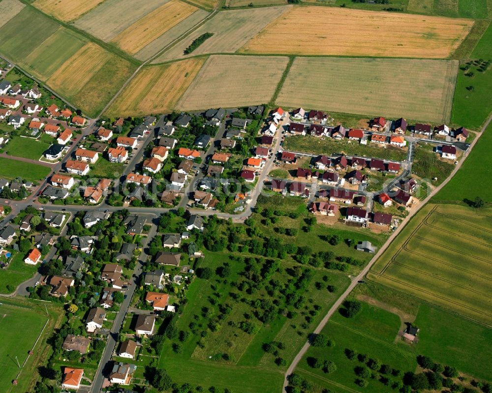 Lindenstruth from above - Residential area of a multi-family house settlement in Lindenstruth in the state Hesse, Germany