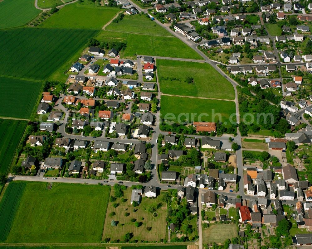 Aerial image Mensfelden - Residential area of a multi-family house settlement in Mensfelden in the state Hesse, Germany