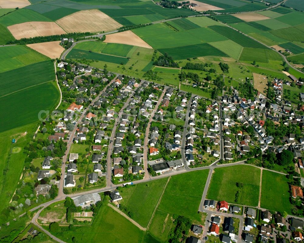 Aerial photograph Mensfelden - Residential area of a multi-family house settlement in Mensfelden in the state Hesse, Germany