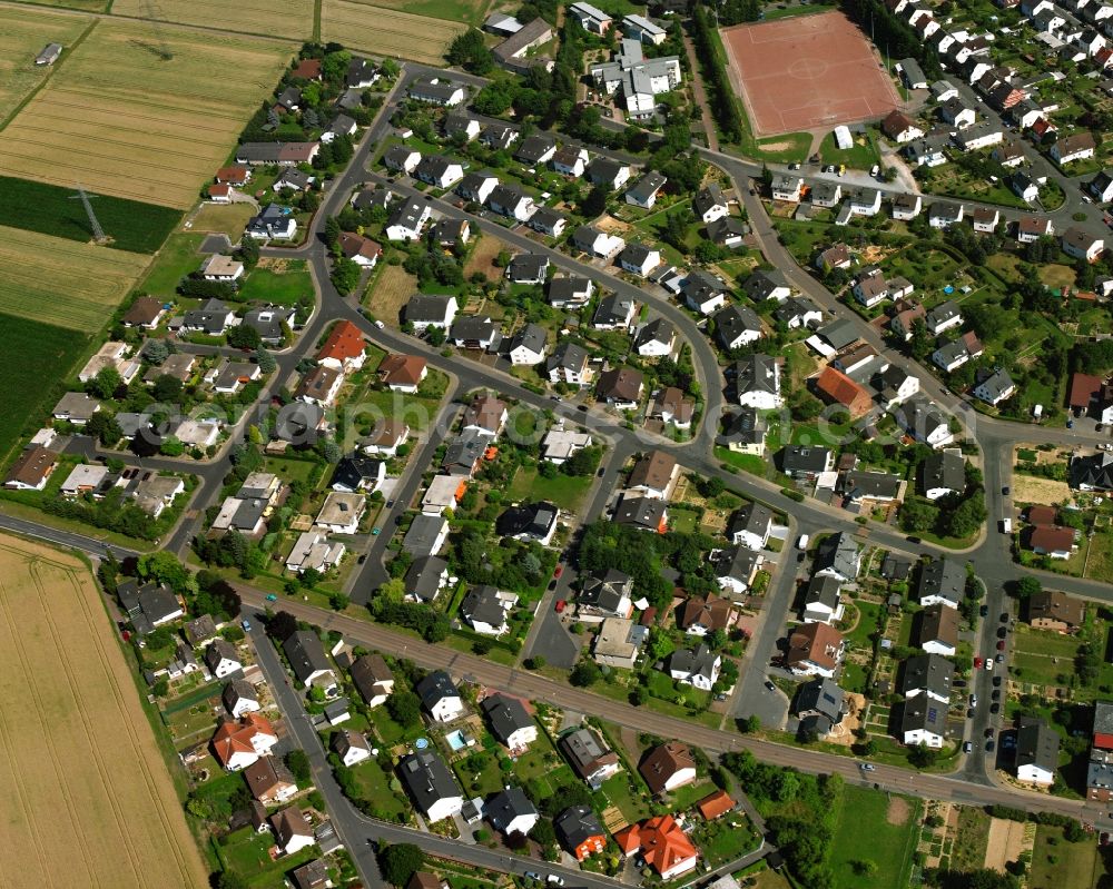 Aerial image Niederbrechen - Residential area of a multi-family house settlement in Niederbrechen in the state Hesse, Germany