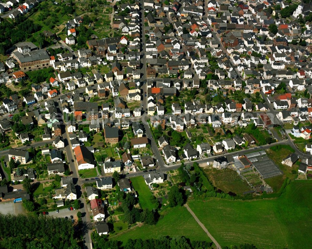 Aerial image Niederbrechen - Residential area of a multi-family house settlement in Niederbrechen in the state Hesse, Germany