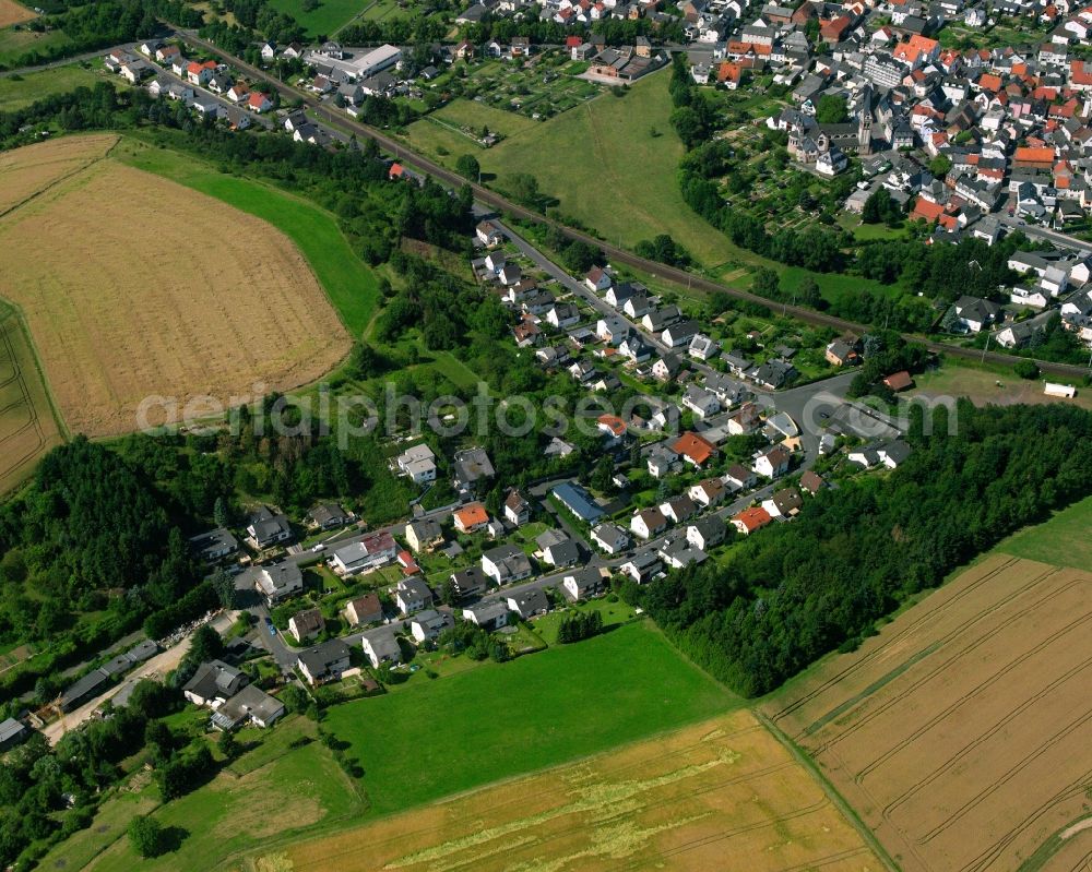 Niederselters from the bird's eye view: Residential area of a multi-family house settlement in Niederselters in the state Hesse, Germany