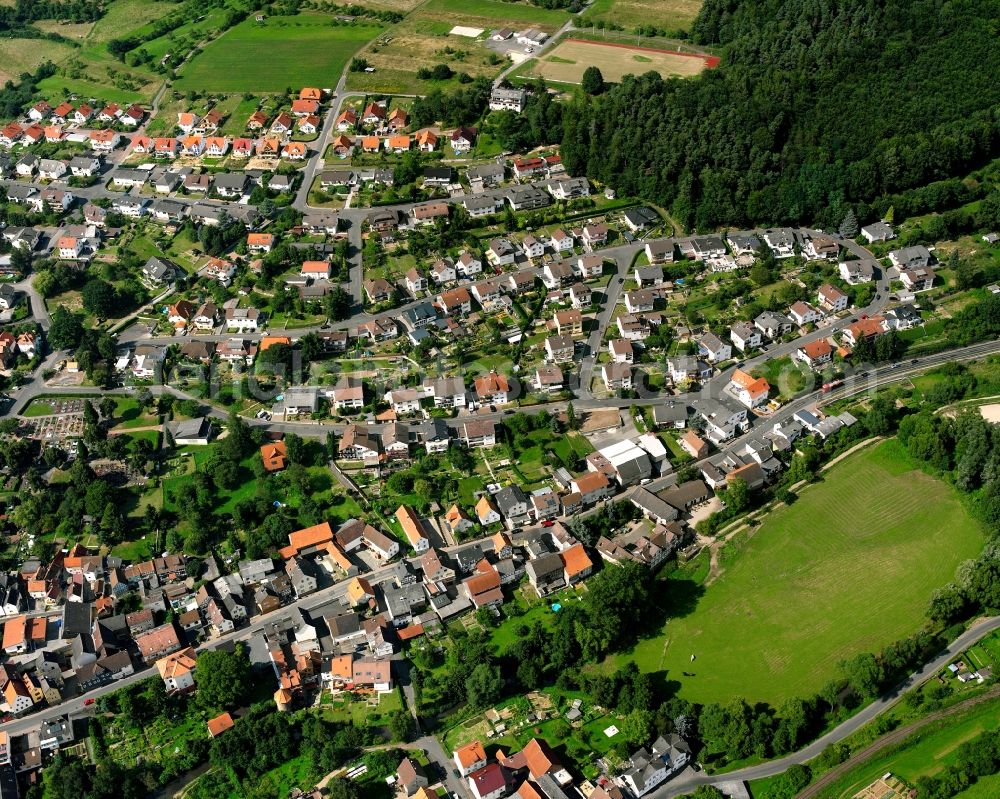 Treis from the bird's eye view: Residential area of a multi-family house settlement in Treis in the state Hesse, Germany