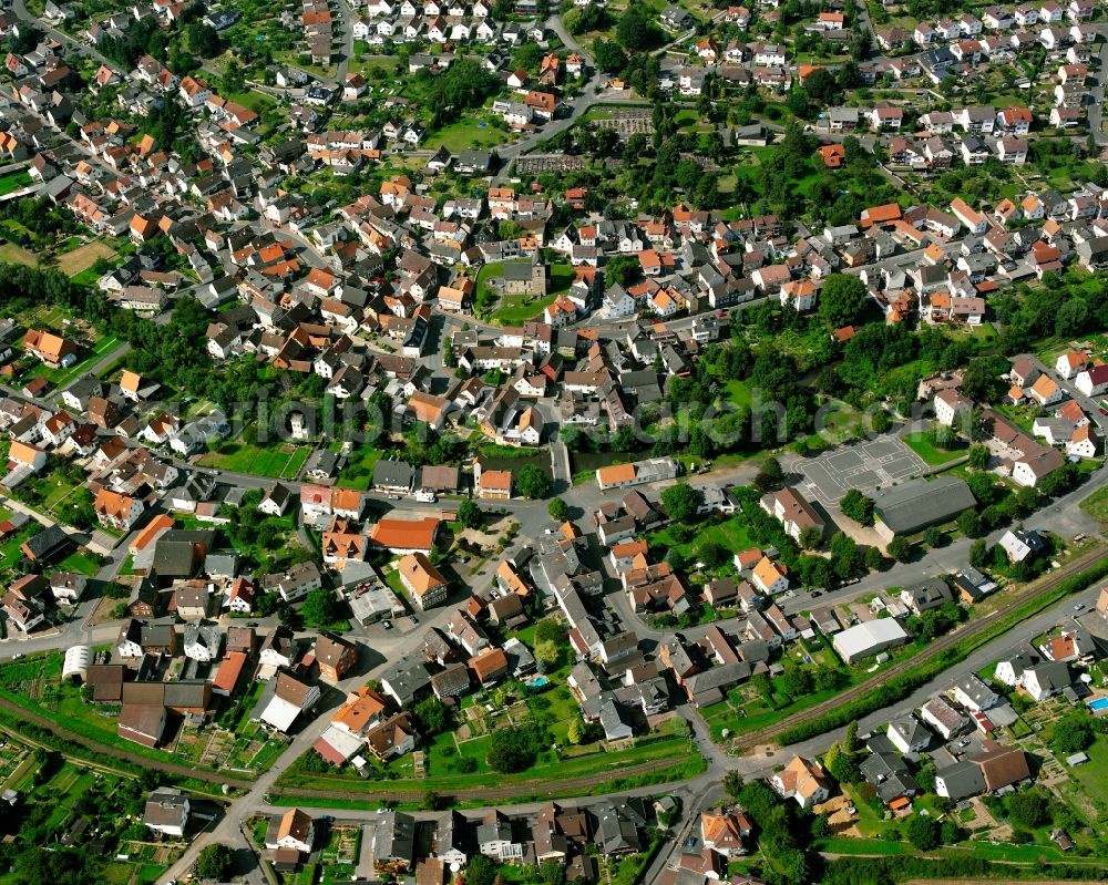 Treis from the bird's eye view: Residential area of a multi-family house settlement in Treis in the state Hesse, Germany