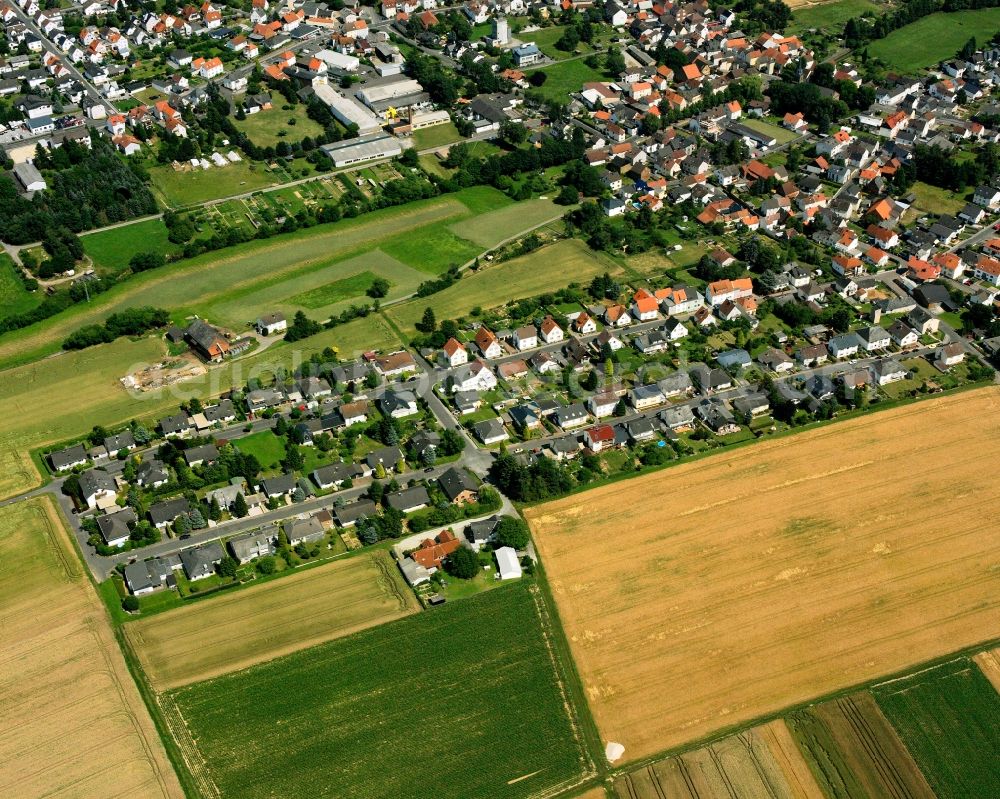 Würges from the bird's eye view: Residential area of a multi-family house settlement in Würges in the state Hesse, Germany