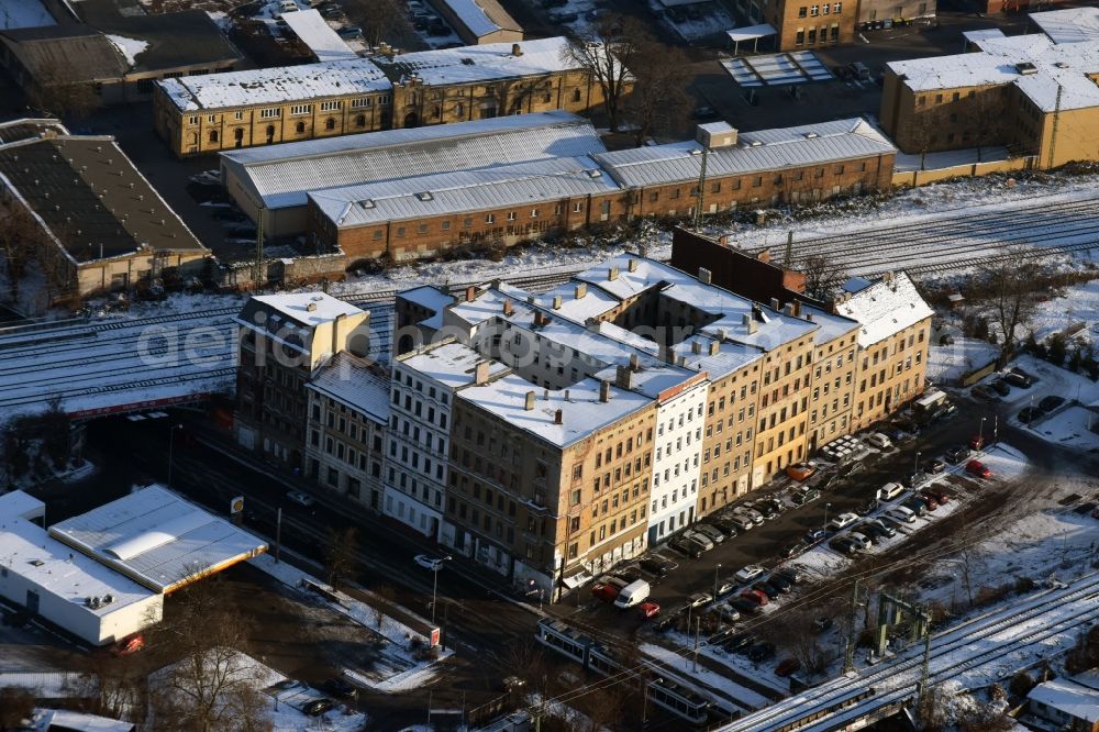 Magdeburg from above - Multi-family house settlement corner Halllische Strasse, Am Sudenburger Tor in between the courses of several railroad tracks of Deutsche Bahn in Magdeburg in the state Saxony-Anhalt