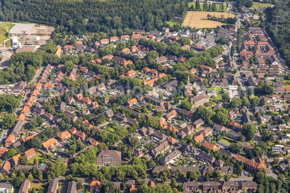 Duisburg from above - Residential area of a multi-family house settlement with a church building in the center between Am Dyck - Dr.-Hans-Boeckler-Strasse - Schachtstrasse in the district Wehofen in Duisburg at Ruhrgebiet in the state North Rhine-Westphalia, Germany