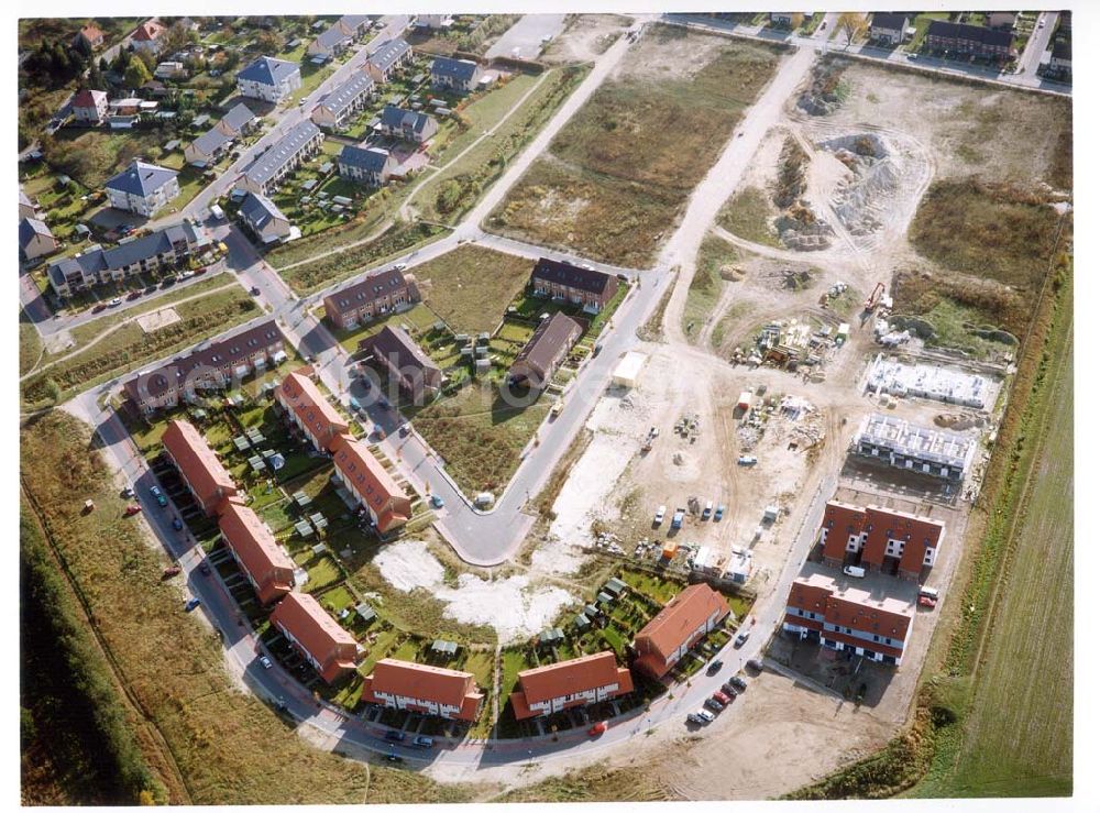 Aerial photograph Dallgow - Mehrfamilienwohnhausneubau der CONTENT BERLIN Bauträger GmbH an der Triftstraße in 14624 Dallgow.