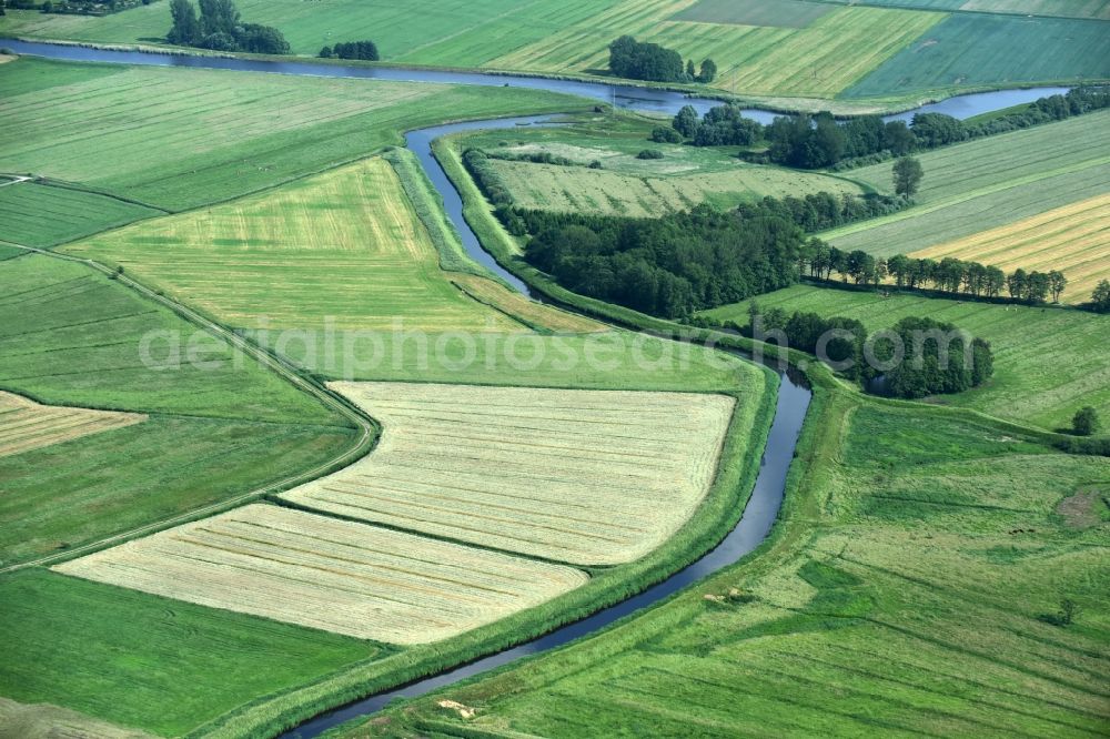 Winseldorf from the bird's eye view: Irrigation and Melioration- channels on agricultural fields in Winseldorf in the state Schleswig-Holstein