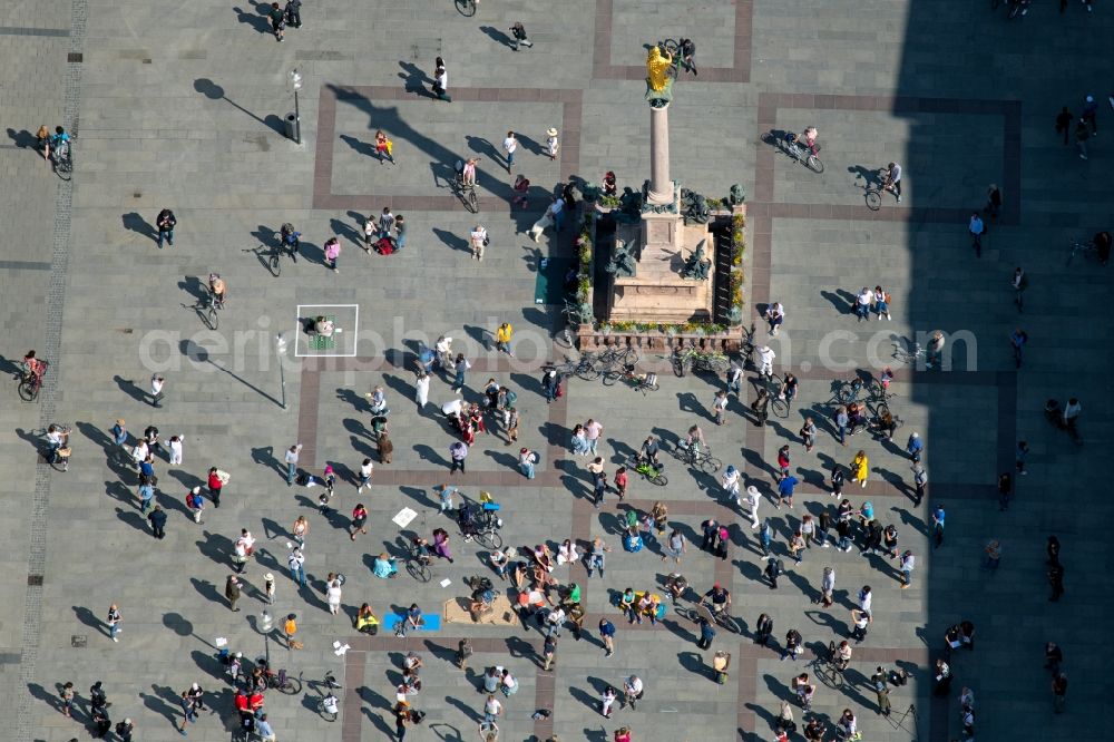 München from above - Peoples on ensemble space an place Marienplatz on Mariensaeule in the inner city center in the district Altstadt in Munich in the state Bavaria, Germany