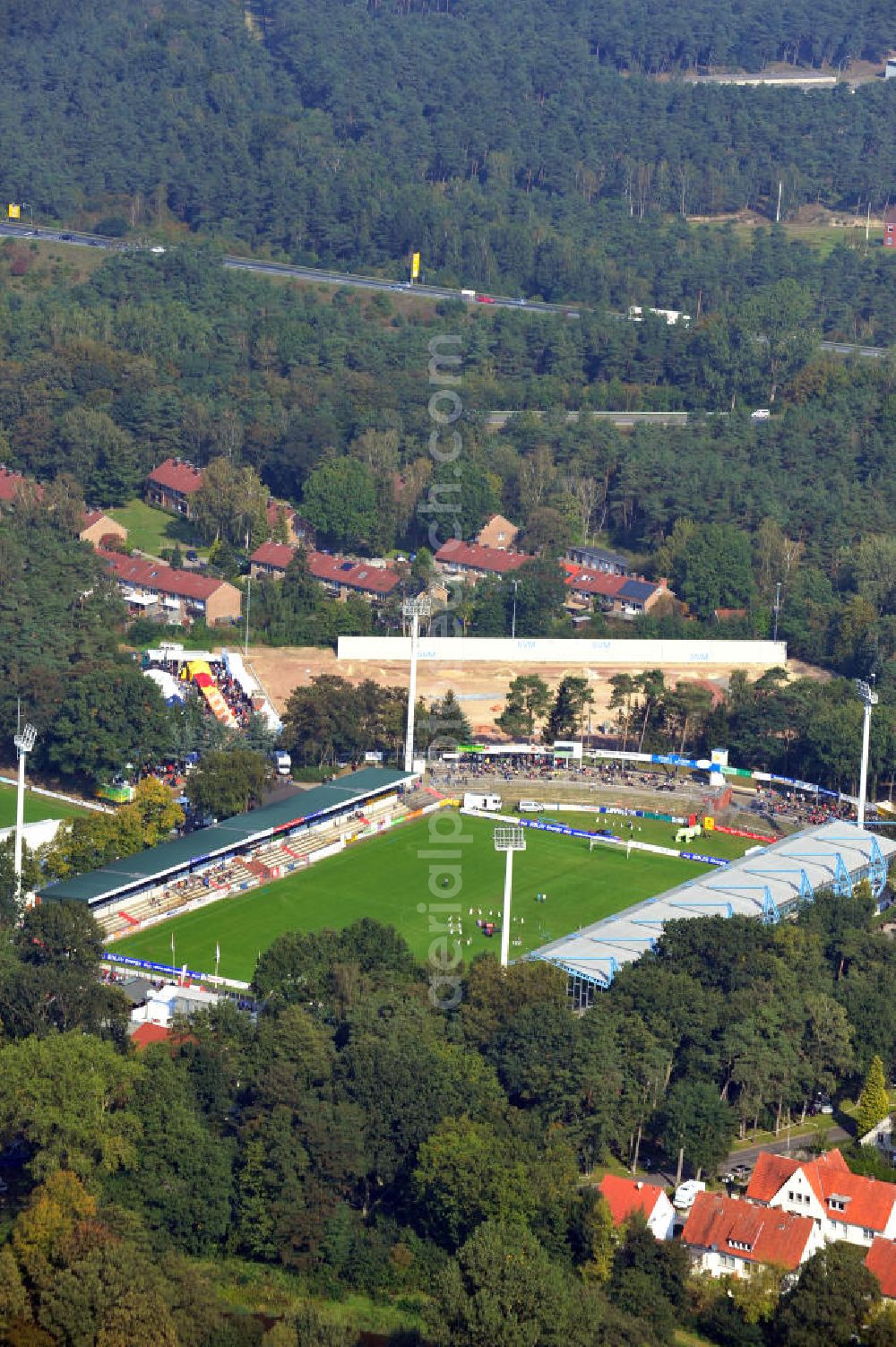 Aerial photograph Meppen - Die MEP-Arena in Meppen Niedersachsen, benannt nach dem Sponsor Meppener-Einkaufs-Passage, ist ein reines Fußballstadion und ist die Heimspielstätte des SV Meppen. The MEP-Arena in Meppen Lower saxony, named by the sponsor Meppener Einkaufs Passage, is a football stadium and the home ground of the SV Meppen.