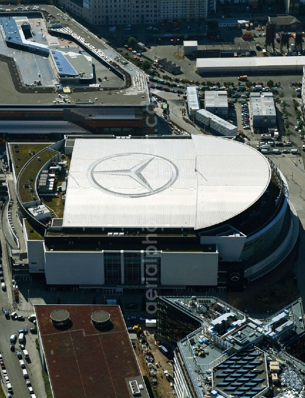 Aerial image Berlin - Arena Mercedes-Benz-Arena on Friedrichshain part of Berlin. The former O2 World - now Mercedes-Benz-Arena - is located in the Anschutz Areal, a business and office space on the riverbank