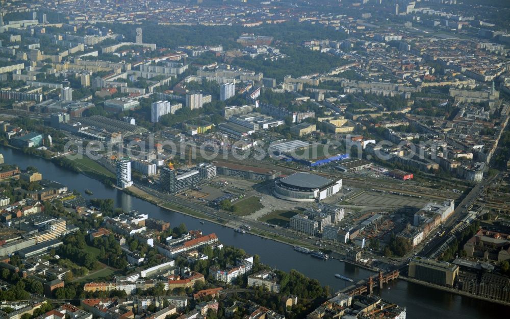 Aerial image Berlin - Mercedes-Benz-Arena on the Spree riverbank in the Friedrichshain part of Berlin. The former O2 World - now Mercedes-Benz-Arena - is located in the Anschutz Areal, a business and office space on the riverbank