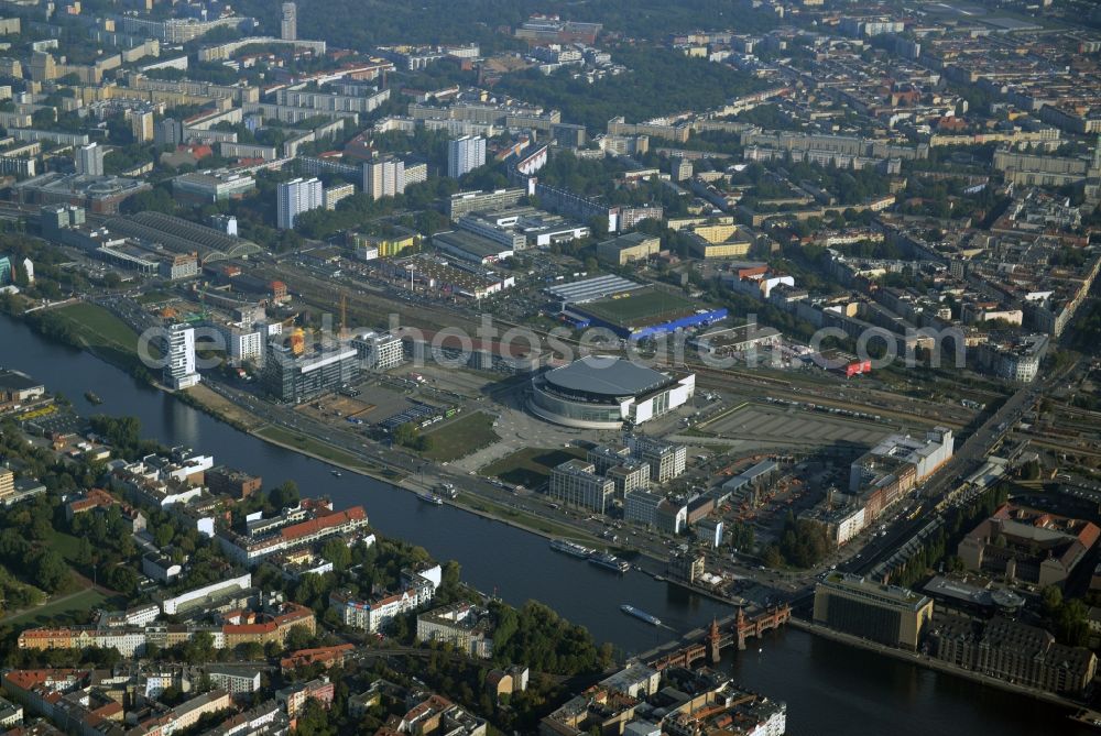 Berlin from above - Mercedes-Benz-Arena on the Spree riverbank in the Friedrichshain part of Berlin. The former O2 World - now Mercedes-Benz-Arena - is located in the Anschutz Areal, a business and office space on the riverbank