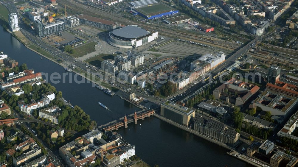 Aerial image Berlin - Mercedes-Benz-Arena on the Spree riverbank in the Friedrichshain part of Berlin. The former O2 World - now Mercedes-Benz-Arena - is located in the Anschutz Areal, a business and office space on the riverbank