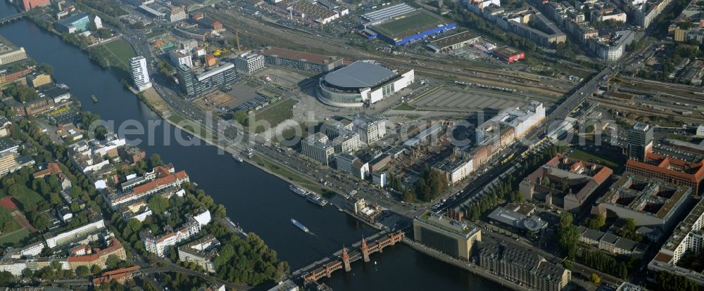 Berlin from above - Mercedes-Benz-Arena on the Spree riverbank in the Friedrichshain part of Berlin. The former O2 World - now Mercedes-Benz-Arena - is located in the Anschutz Areal, a business and office space on the riverbank