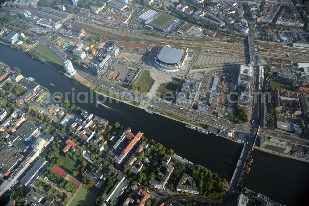 Berlin from above - Mercedes-Benz-Arena on the Spree riverbank in the Friedrichshain part of Berlin. The former O2 World - now Mercedes-Benz-Arena - is located in the Anschutz Areal, a business and office space on the riverbank